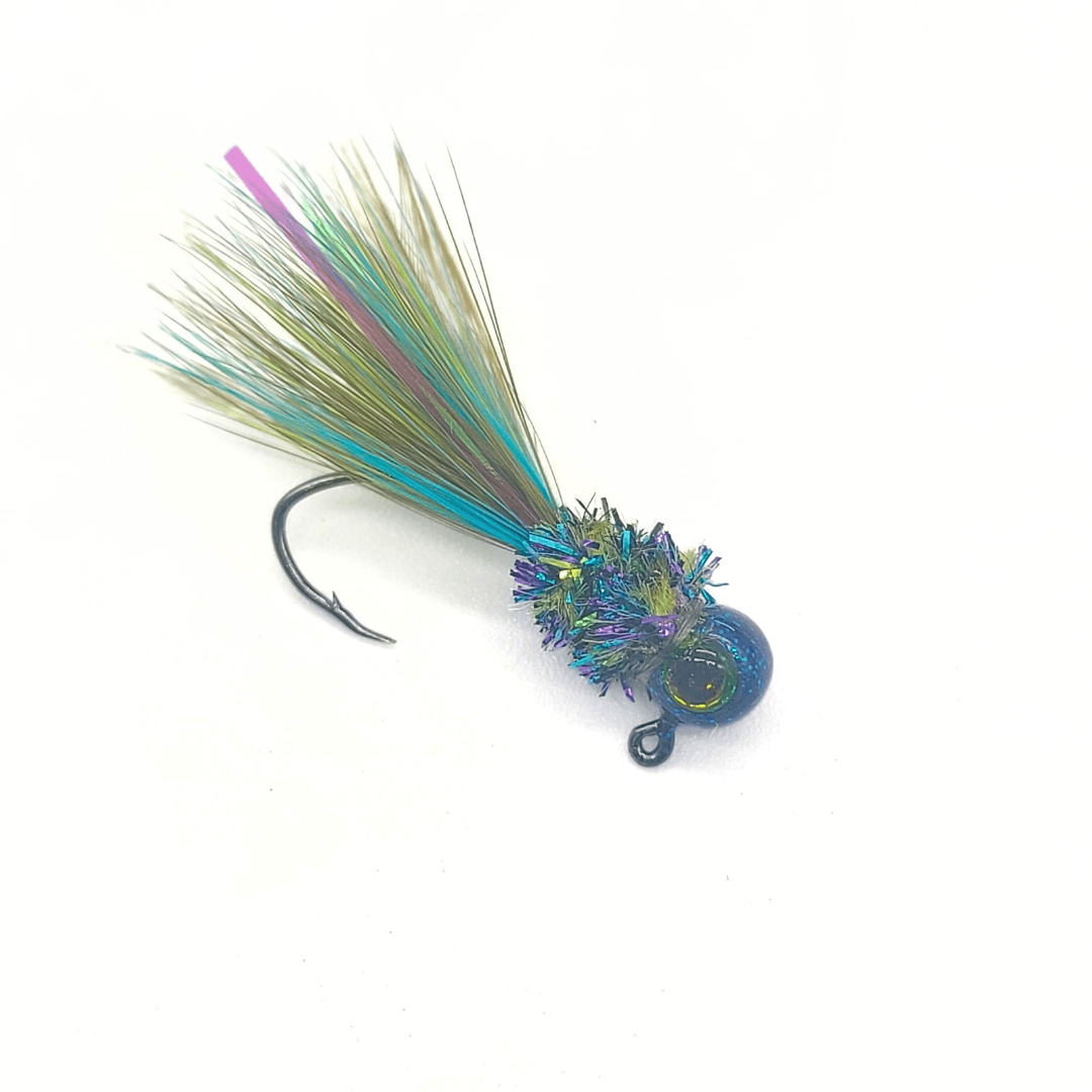Hand tied Crappie jig featuring a sapphire freestyle head, holographic 3D eyes, chenille, olive and blue rooster hackle. Hand tied onto a #4 Mustad sickle hook by Ramble Tamble Tackle.