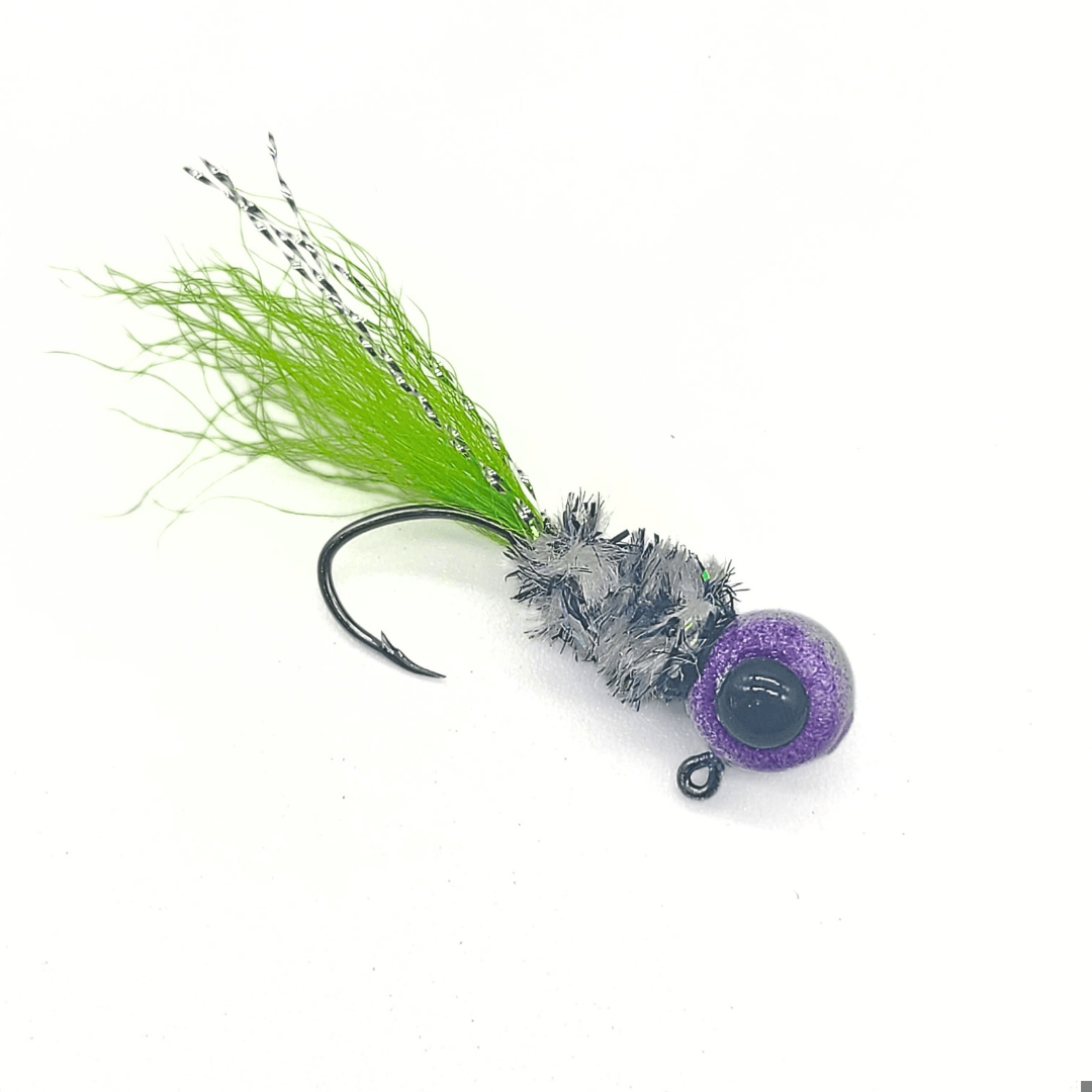 Hand-tied crappie jig with a custom painted head, soft chenille body, kip tail, and flash accents, designed for crappie fishing.