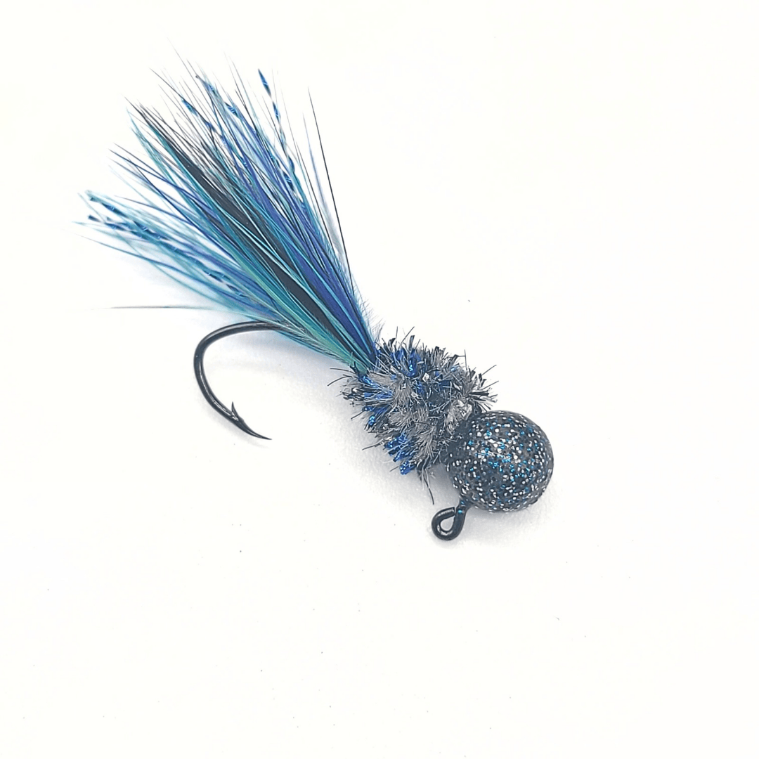 Hand-tied crappie jig with a custom painted head, soft chenille body, feathered tail, and flash accents, designed for crappie fishing.