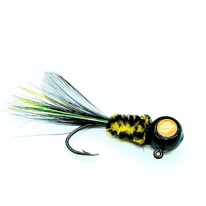 Hand tied crappie jig with a multi-colored feather tail, including shades of green, yellow, and black. The body is wrapped in a black and yellow striped synthetic material, creating a bumblebee-like appearance. The jig head is round and black with an orange dot on the front. This crappie lure features a sickle hook, designed to attract fish by mimicking the appearance and movement of prey in the water, making it an effective and visually appealing bait for crappie fishing. This fishing lure is hand tied 