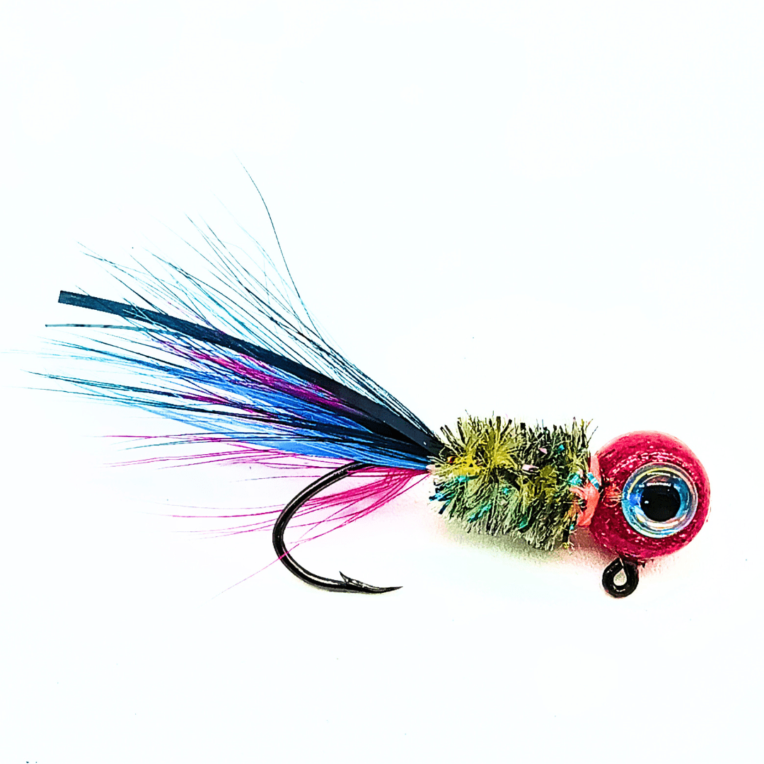 "Hand tied crappie jig with a multicolored feather tail featuring shades of blue, purple, and black, a bright green sparkly body made of synthetic material, and a round red jig head with a prominent eye detail. This crappie lure features a sickle hook, designed to attract fish by mimicking the appearance and movement of prey in the water, making it an effective and visually appealing bait for crappie fishing. This fishing lure is hand tied by Ramble Tamble Tackle."